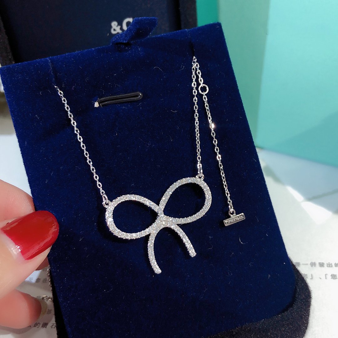 [Lioran]CLAW SET RHODIUM PLATED BOW NECKLACE