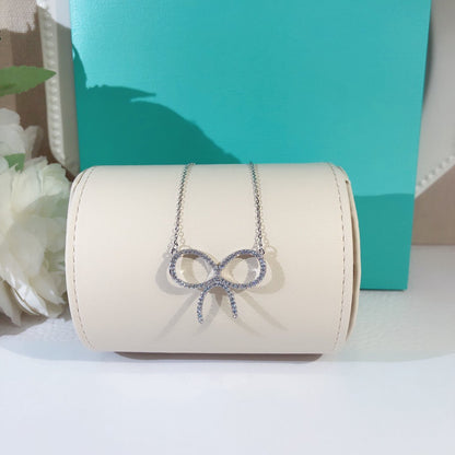 [Lioran]CLAW SET RHODIUM PLATED BOW NECKLACE